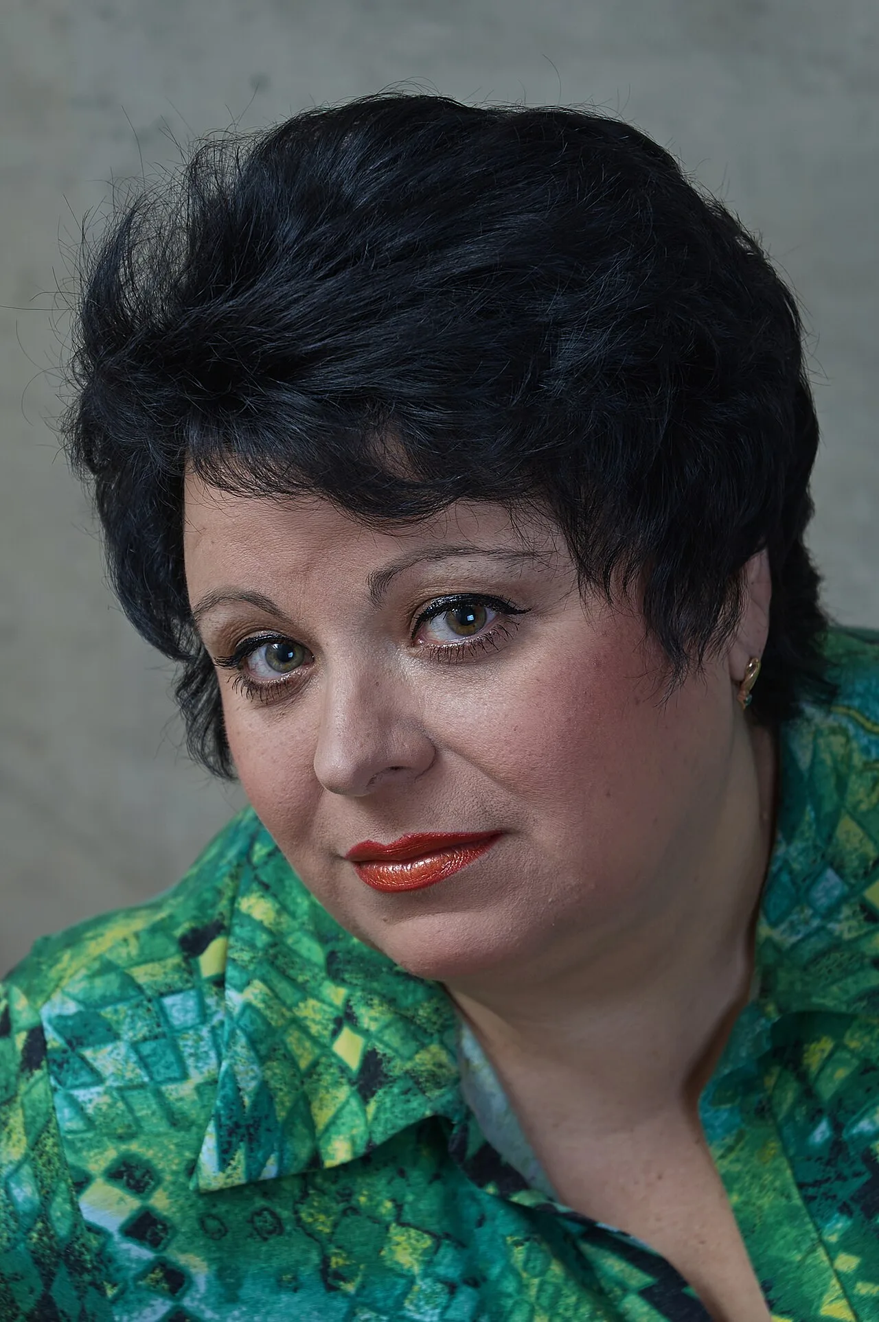 Portrait of an adult woman with dark hair